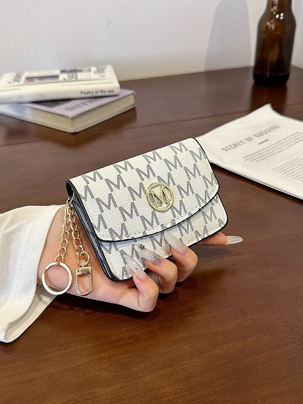 Retro monogramprint kunstleren - Monogram Keychain Leather recensie en prijs
